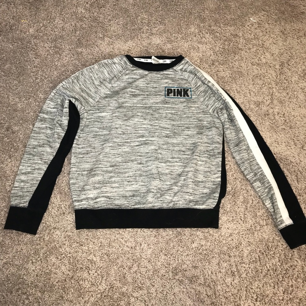 A Victoria’s Secret pink sweatshirt